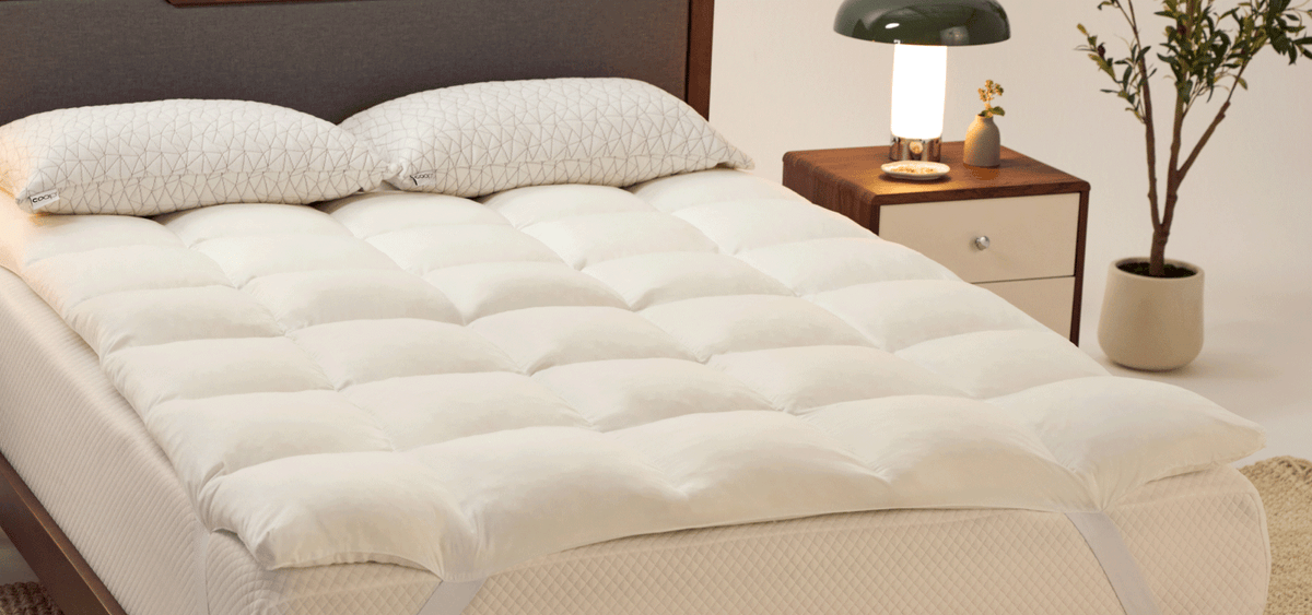 Woman laying on sheets