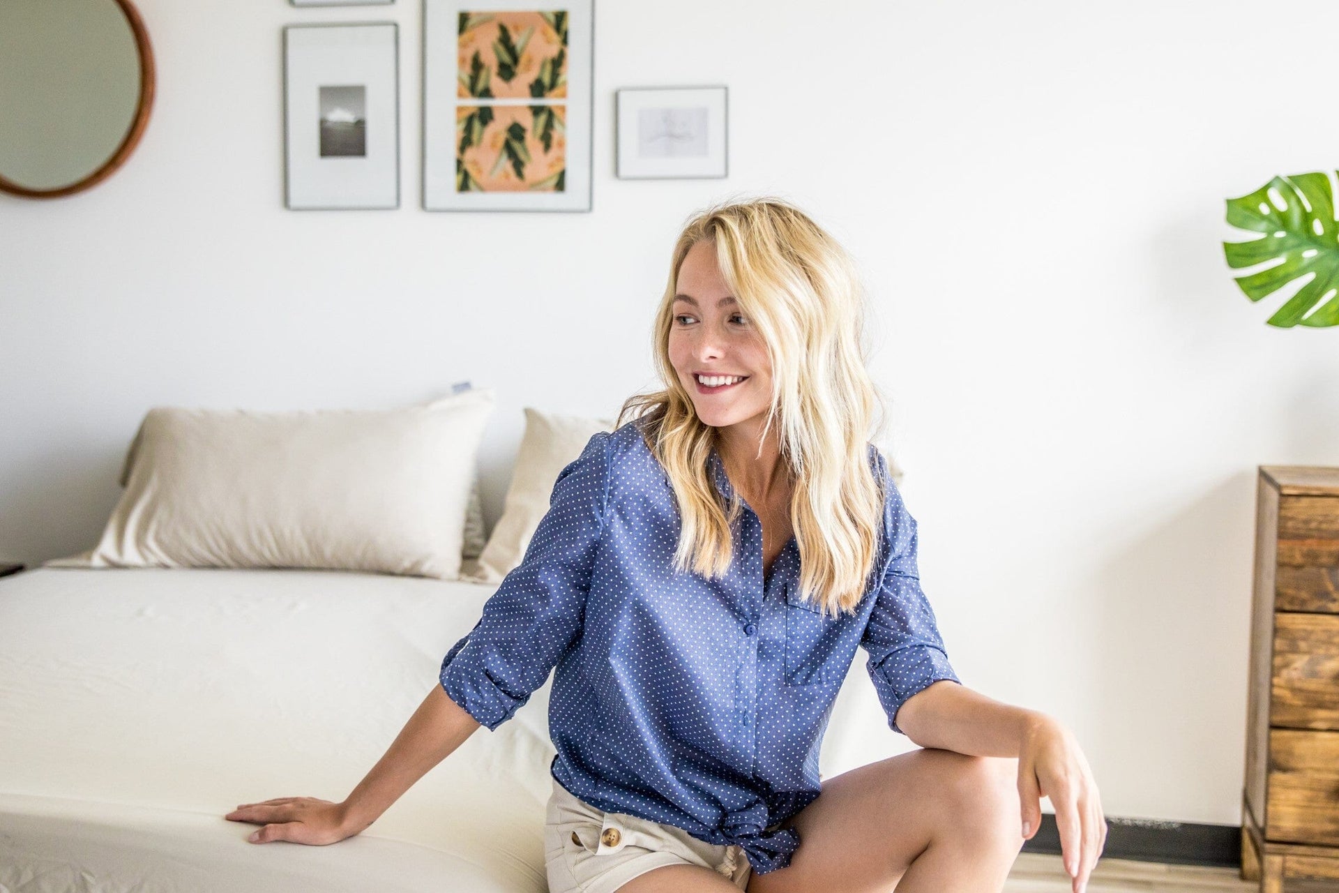 Girl sitting on bed