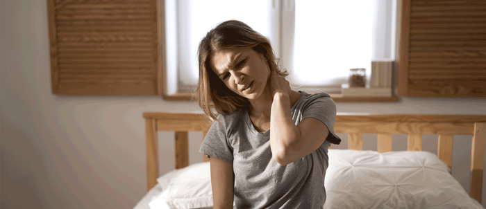Woman laying on sheets